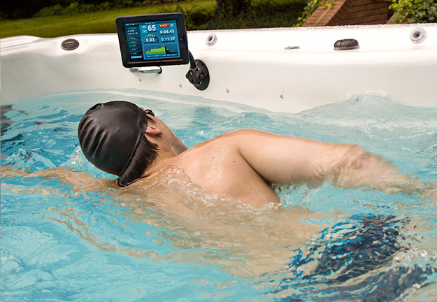 A swimmer monitors his workout with the SwimNumber iPad App.
